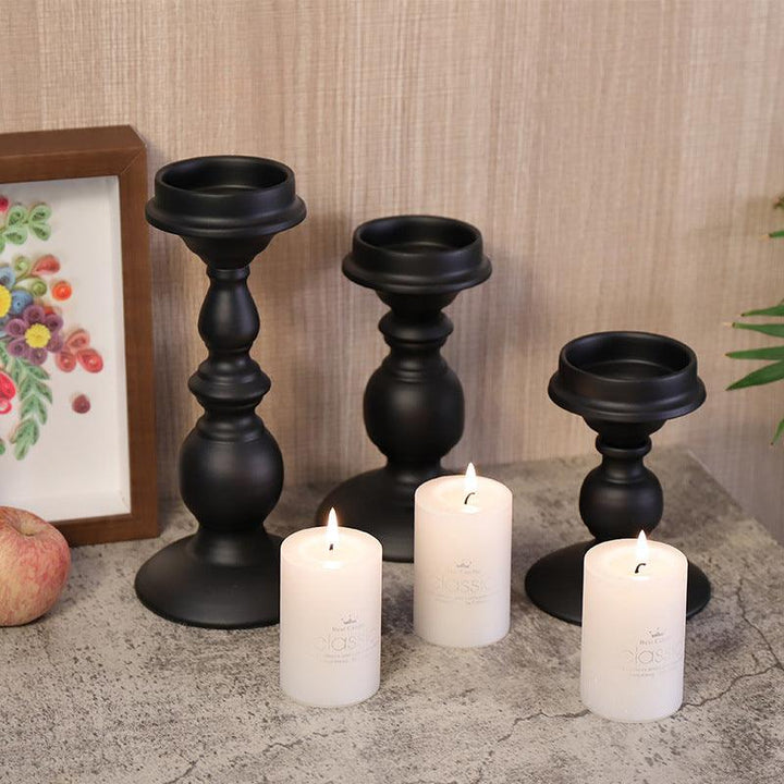 american gothic black vintage candle holder on the table
