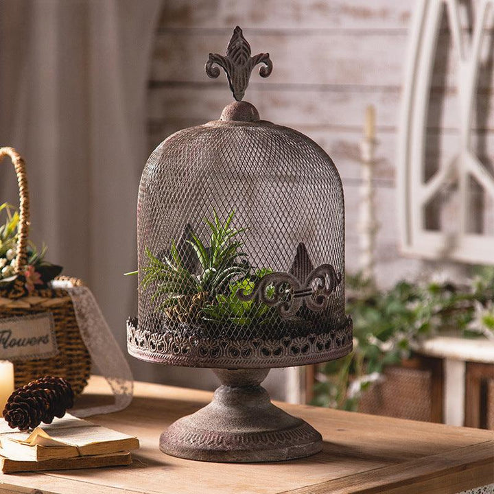 american industrial vintage iron birdcage candle holder on the table