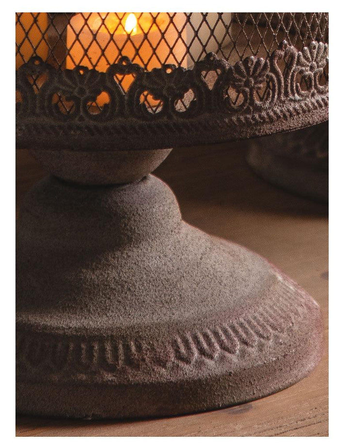 details of american industrial vintage iron birdcage candle holder on the table