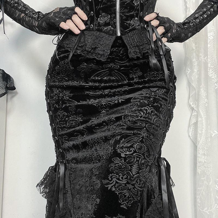 a woman wear a black gothic lace mermaid dress