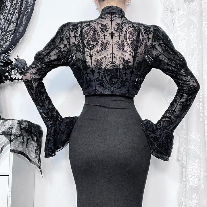 a woman wear a black gothic lace skeleton embroidered top blouse