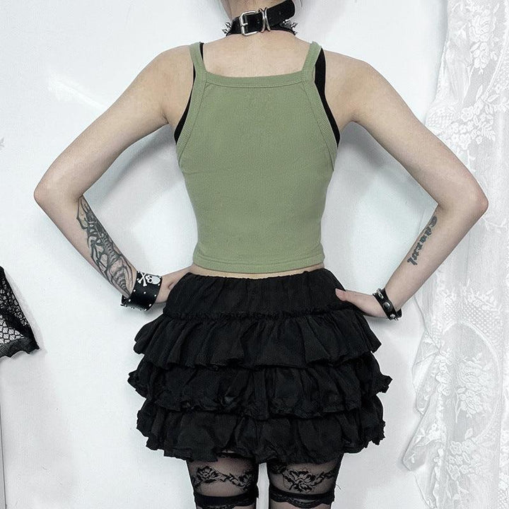 a woman wear a black green gothic casual printed knit top vest
