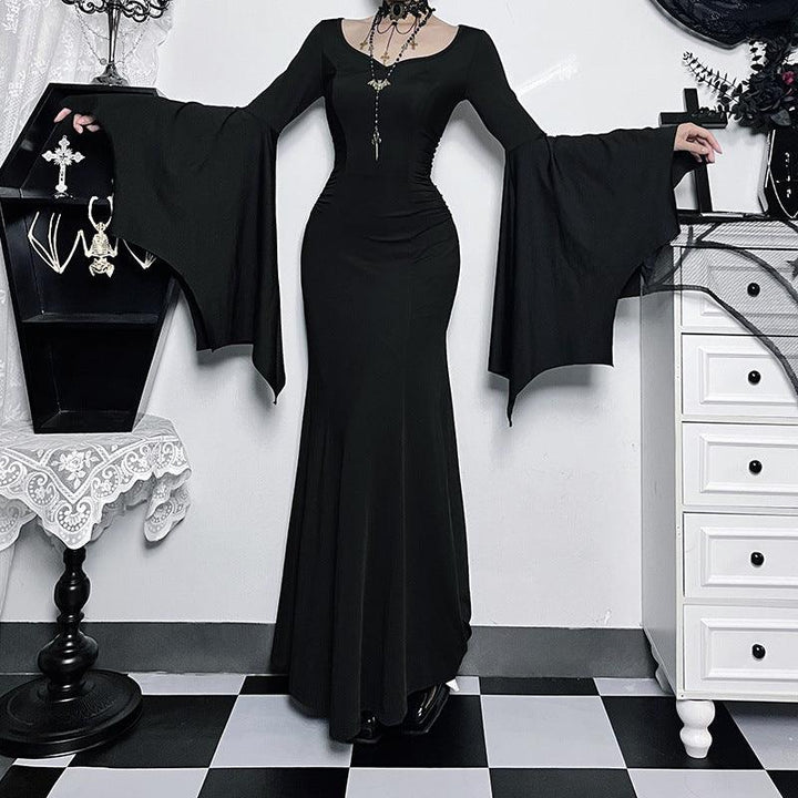 a woman wear a black long sleeve gothic formal dress