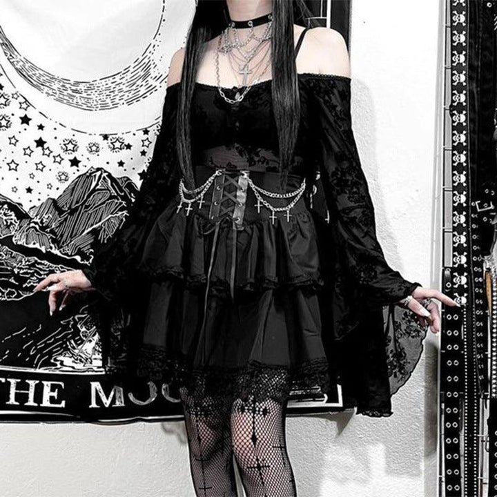 a woman wear a black punk short gothic dress