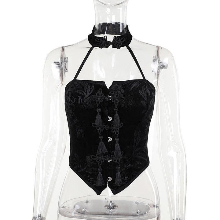 a woman wear a black sexy goth outfit necklace sleeveless tank