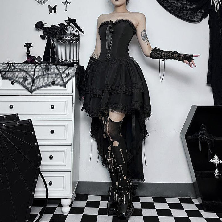 a woman wear a black sleeveless lolita corset long dress