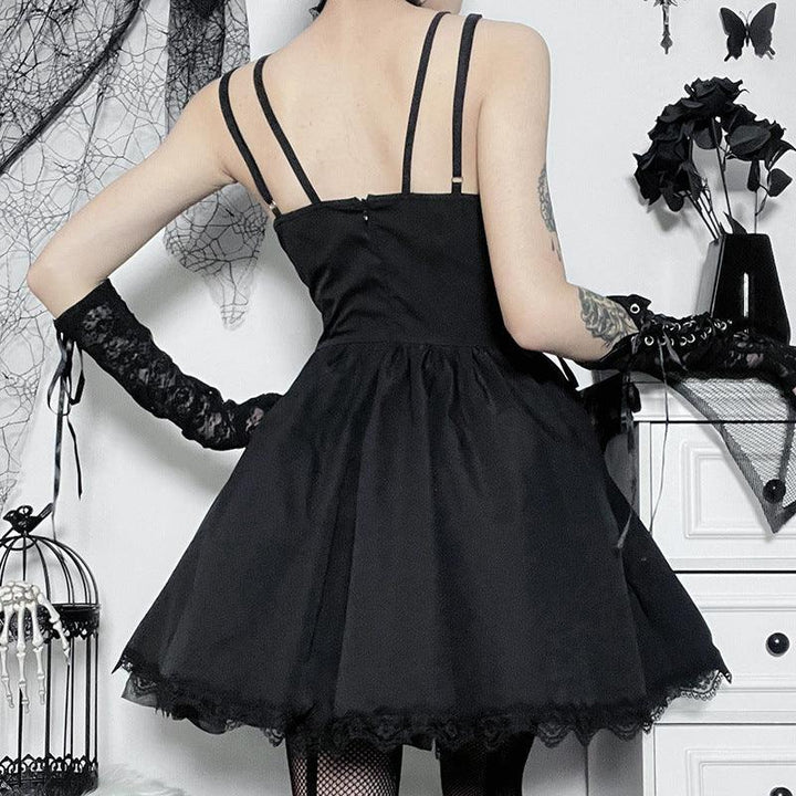 a woman wear a black sleeveless vampire gothic wedding dress