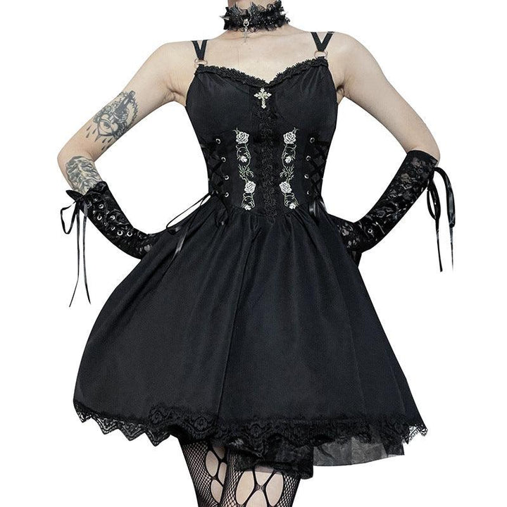 a woman wear a black sleeveless vampire gothic wedding dress