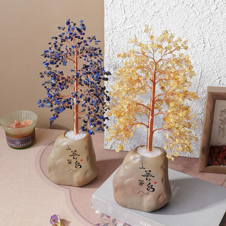 two citrine gemstone bonsai tree with chinese style pot base on the table
