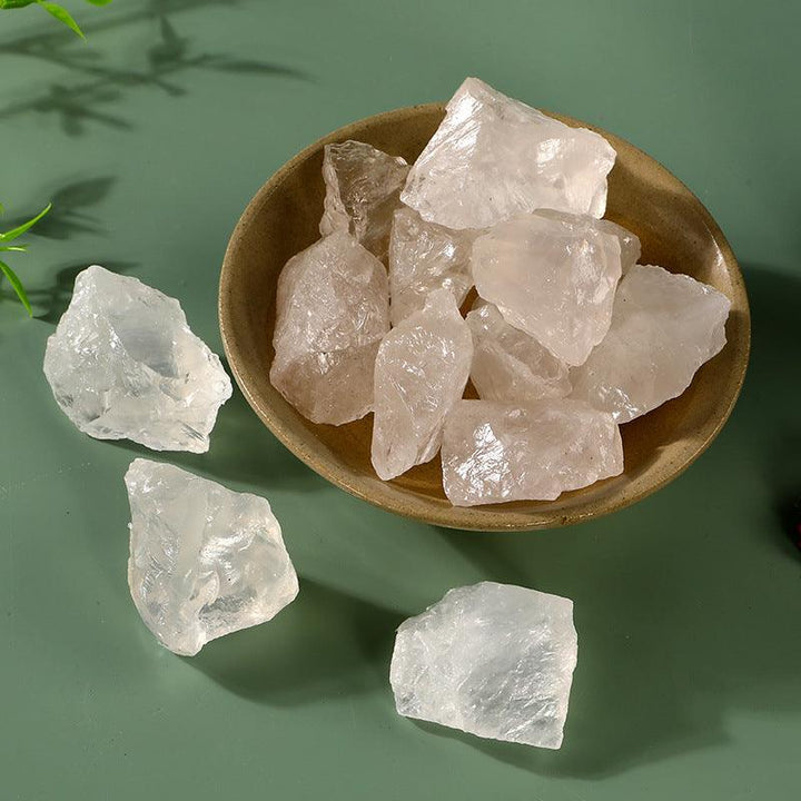 clear crystal raw stone aromatherapy incense stone on the table