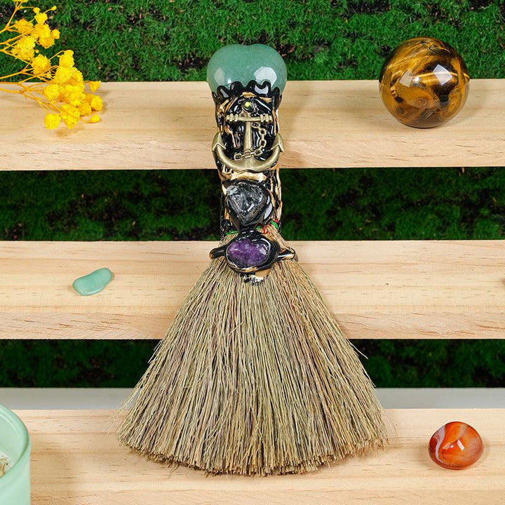 details of crystal magic broom raw stone heart shaped witchcrafts broom