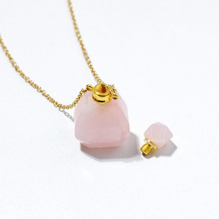 details of crystal perfume bottle raw stone necklace pendant
