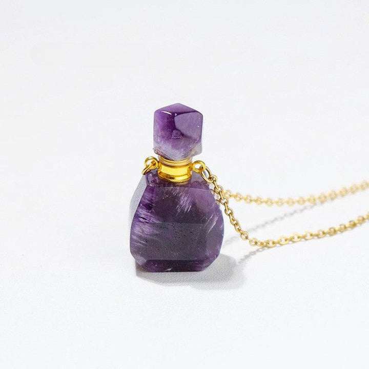 details of crystal perfume bottle raw stone necklace pendant