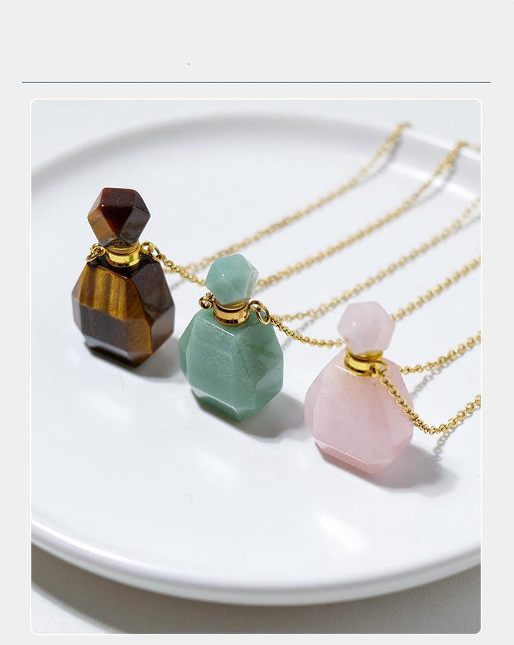 details of crystal perfume bottle raw stone necklace pendant