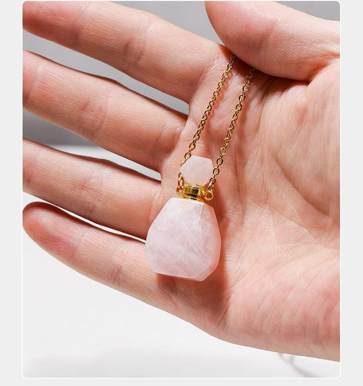 details of crystal perfume bottle raw stone necklace pendant