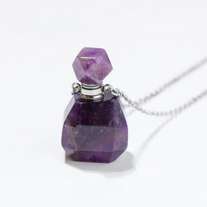 details of crystal perfume bottle raw stone necklace pendant