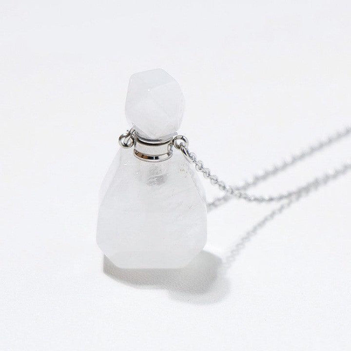 details of crystal perfume bottle raw stone necklace pendant