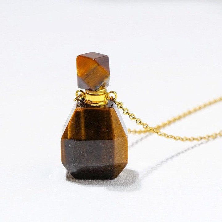 details of crystal perfume bottle raw stone necklace pendant