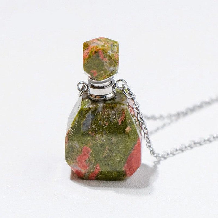 details of crystal perfume bottle raw stone necklace pendant