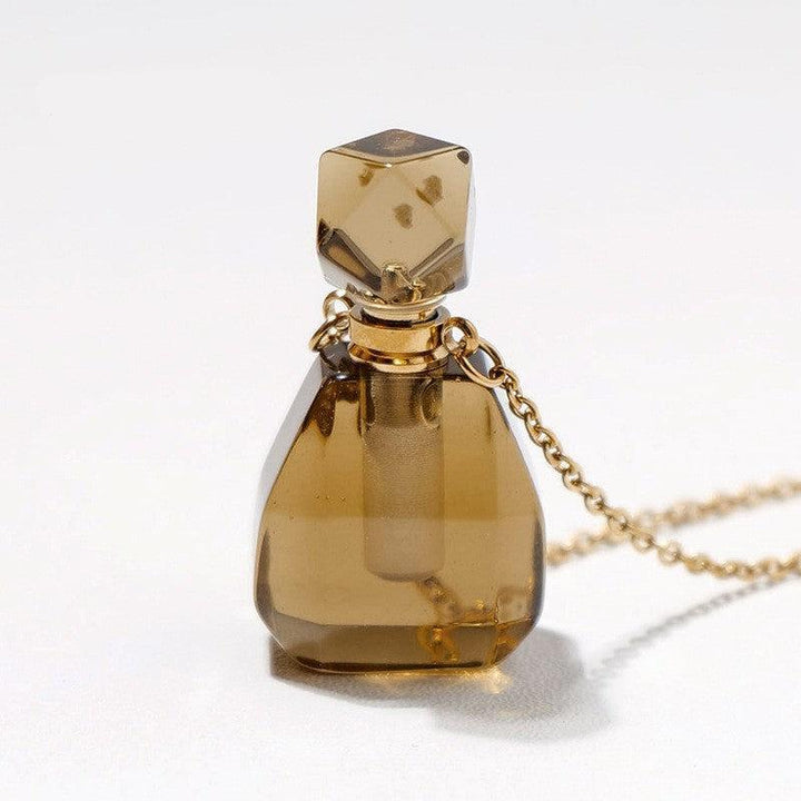 details of crystal perfume bottle raw stone necklace pendant