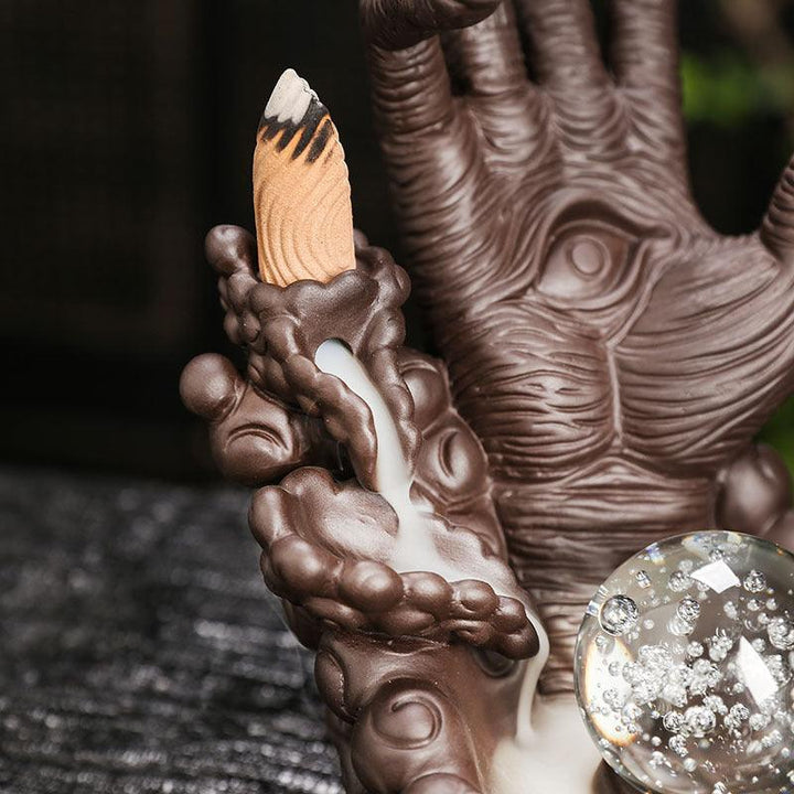 details of devils hand and eye with led light backflow incense burner holder 
