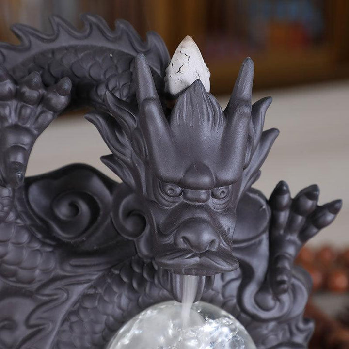 details of dragon playing with pearls backflow incense burner holder