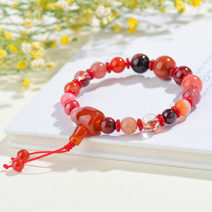 fire element bracelet five elements crystal feng shui bracelet on the table