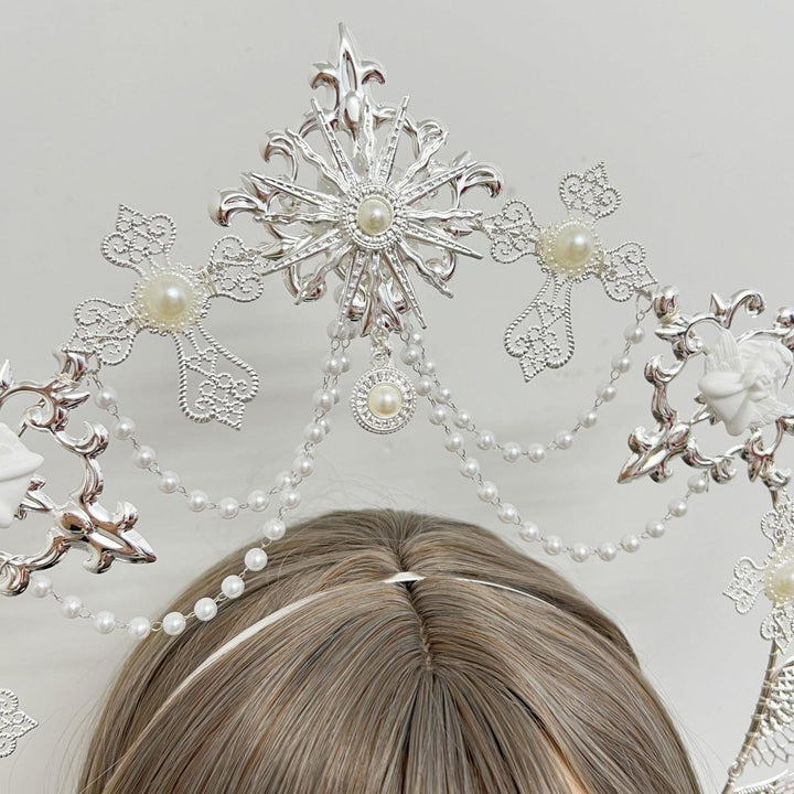 details of white gothic halo crown headwear with beaded pendant