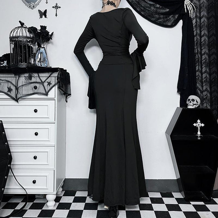 a woman wear the adams family fishtail goth long dress