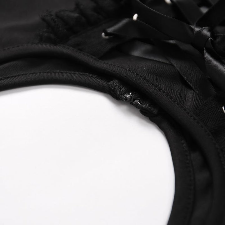details of a gothic punk strappy black sleeveless top vest