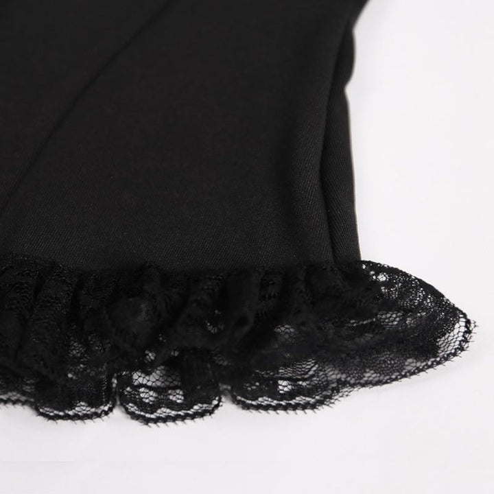 details of a gothic punk strappy black sleeveless top vest