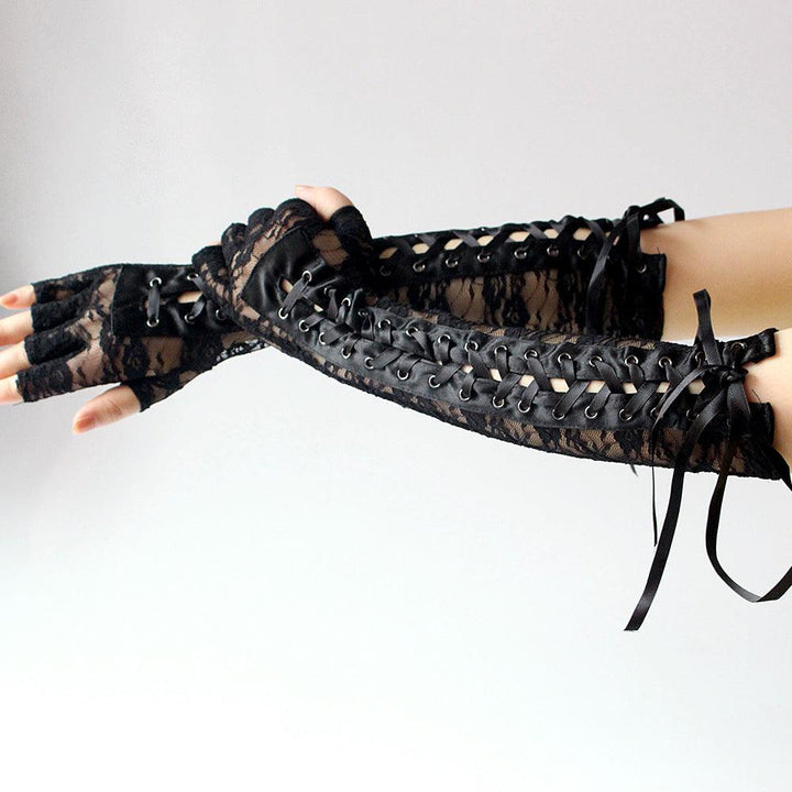 a woman wear gothic sexy black lace strap long gloves