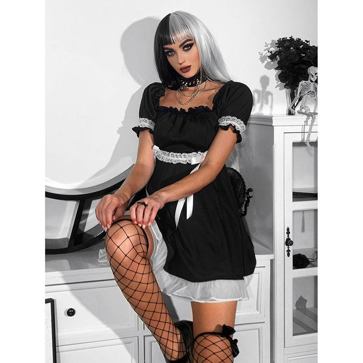 a woman wear a gothic sexy bubble sleeve princess dress set on the table