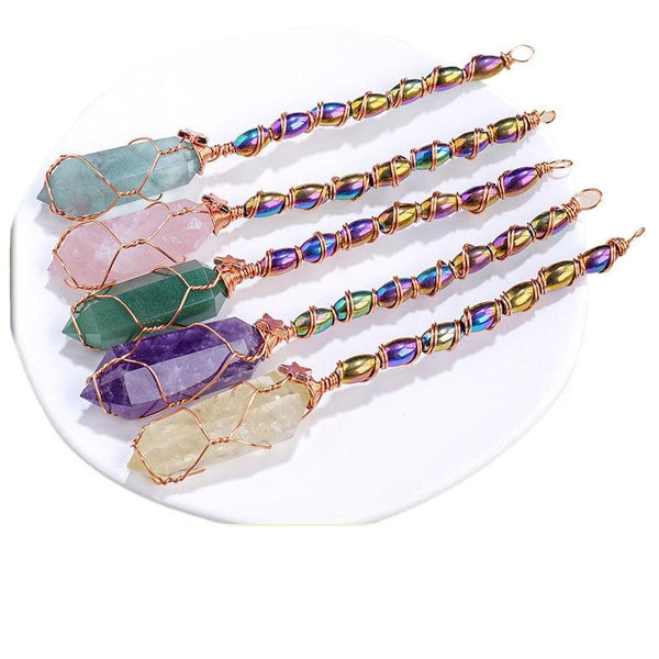 hexagonal crystal magic energy wand with gold wire wrapping