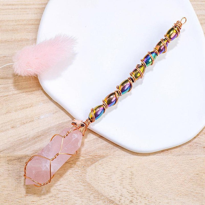 hexagonal Rose Quartz crystal magic energy wand with gold wire wrapping