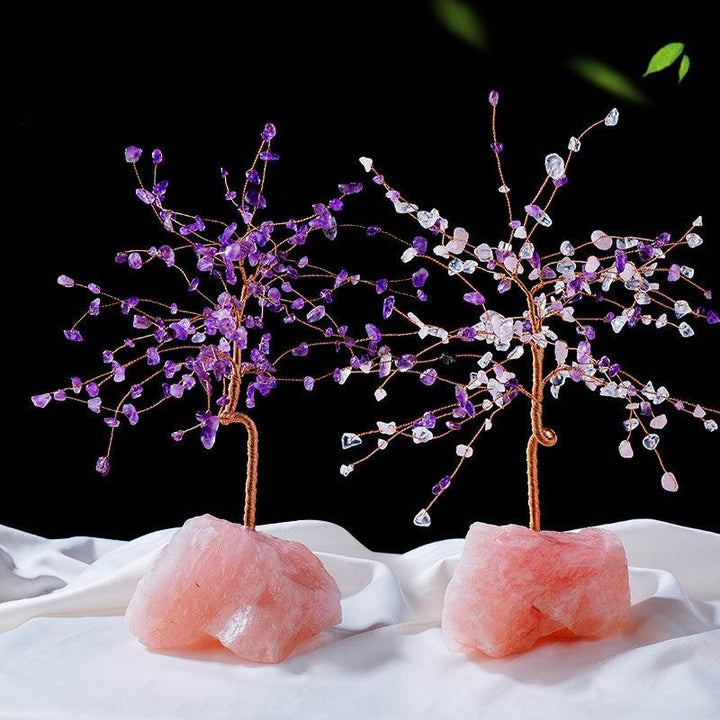 two natural crystal bonsai tree with raw rose quartz base