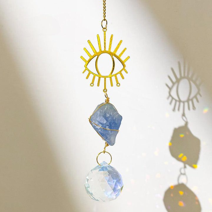 Celestite crystal dreamcatcher wind chime pendant with evil eye
