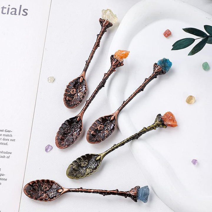 natural crystal stone spoon with vintage carving on the table
