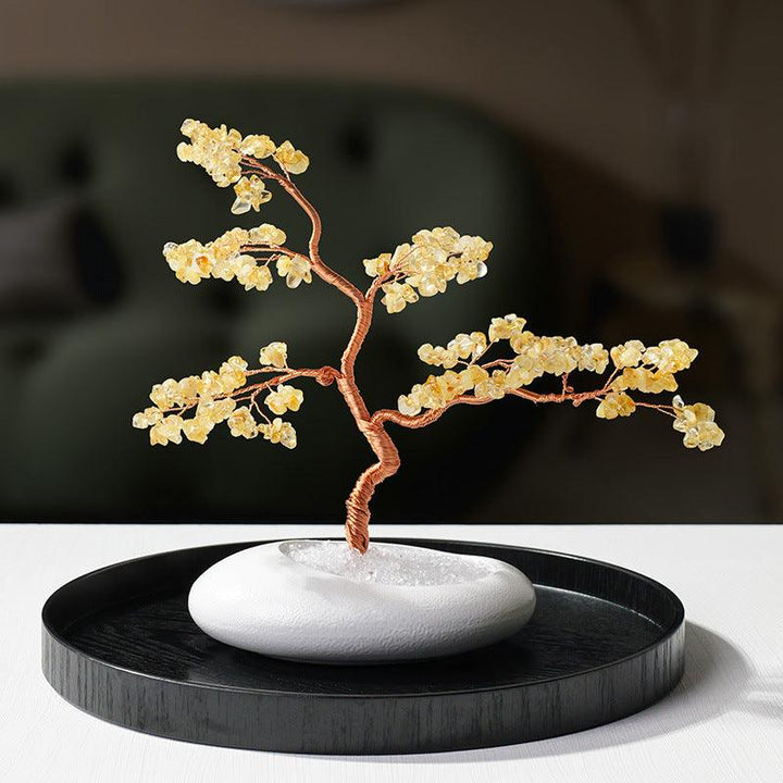 natural crystal wealth tree with welcome pine bonsai on the table