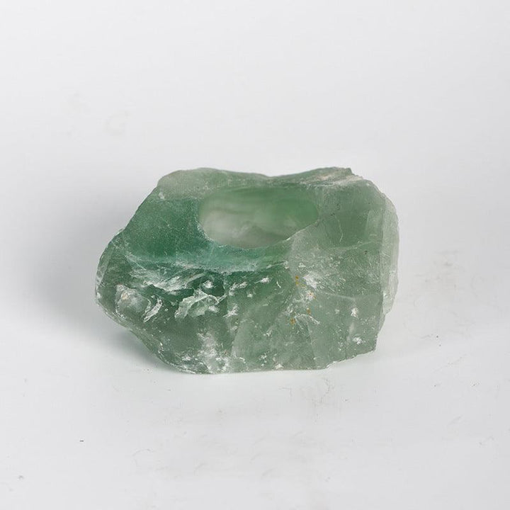 natural Green Fluorite crystal raw stone candle holder on the table