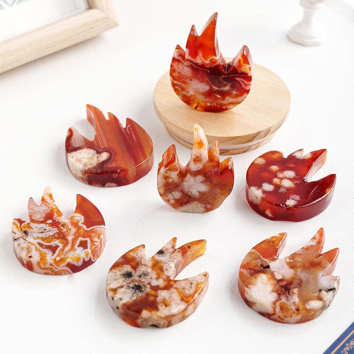 natural red agate flame carving home decor ornament on the table
