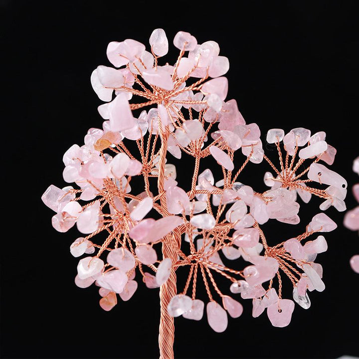 details of natural rose quartz crystal bonsai tree with round base
