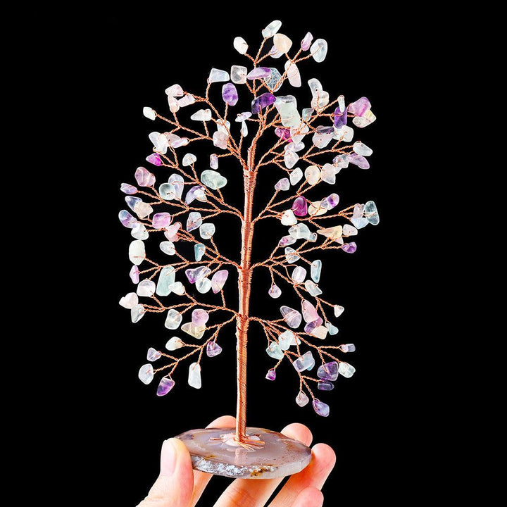 natural tall crystal chip agate base wealth tree on the hand