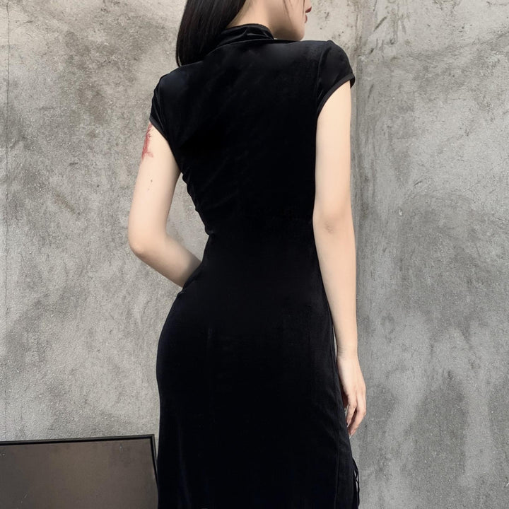 a woman wear a plus size black gothic vintage cheongsam long dress