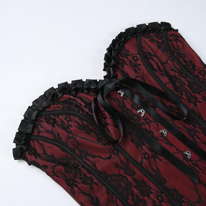 details of red and black gothic lace tie up top