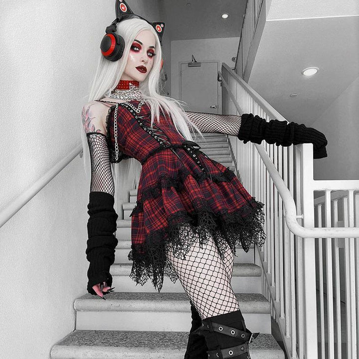 a woman wear a red and black gothic corset dress