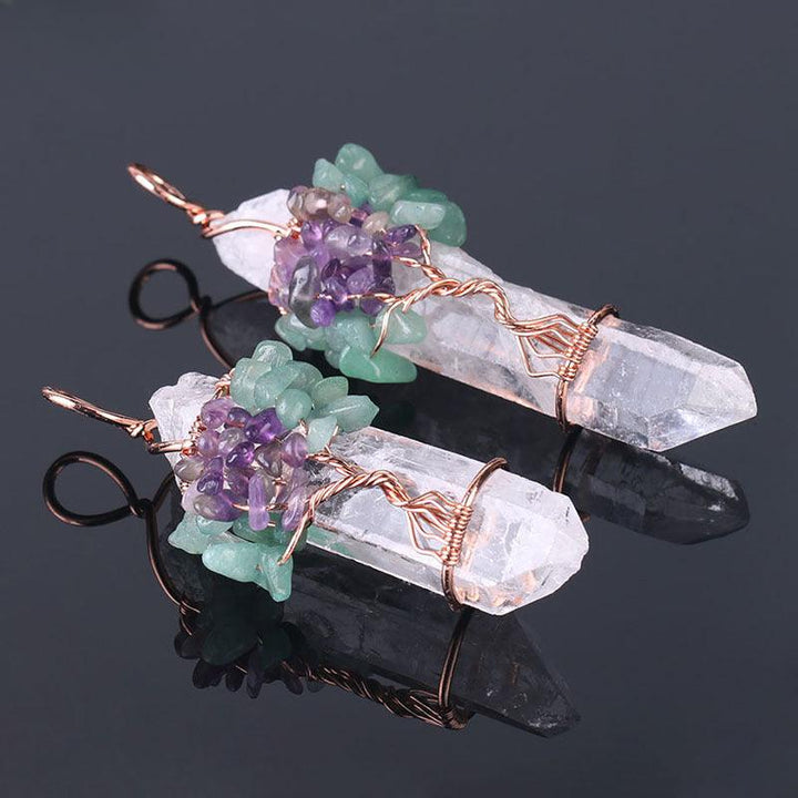 tree of life clear crystal stone pendant spirit pendulum pendant on the table