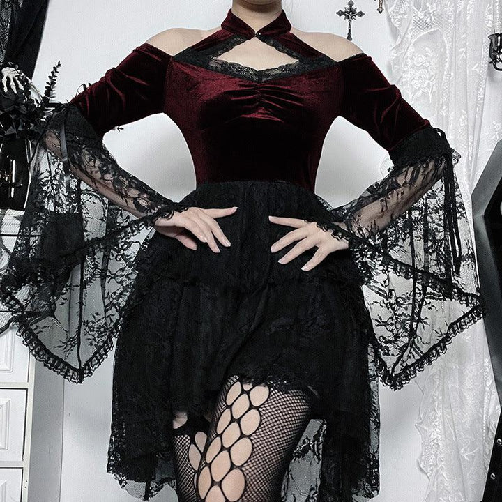 a woman wear a red and black long sleeve gothic sexy lace dress